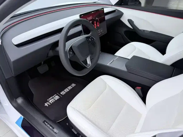 Tesla Model 3 — Фото автомобиля 24