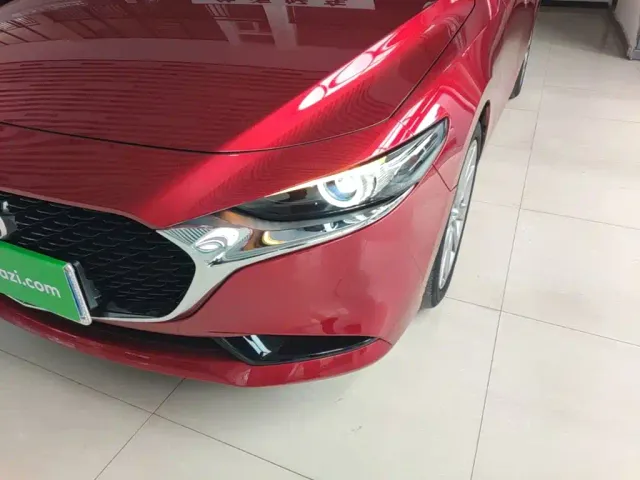 Mazda Axela — Фото автомобиля 23