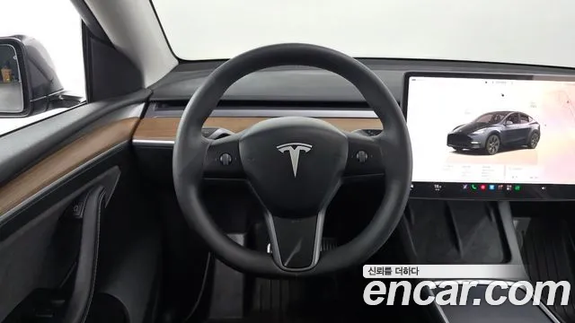 Tesla Model Y — Фото автомобиля 12