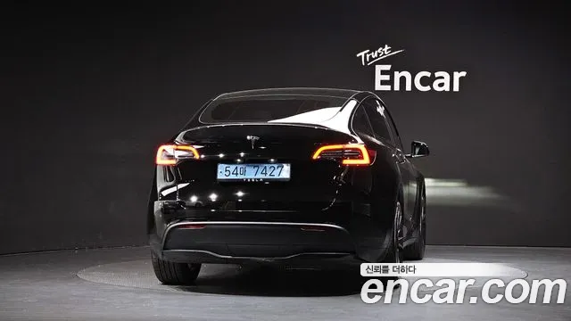 Tesla Model Y — Фото автомобиля 4