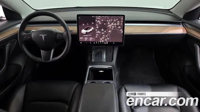 Tesla Model 3 — Фото автомобиля 10