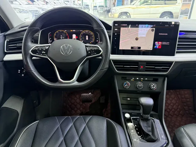 Volkswagen Tiguan L — Фото автомобиля 11