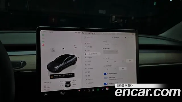 Tesla Model 3 — Фото автомобиля 23