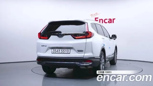 Honda CR-V CR-V 5-е поколение 2.0 гибрид Touring 4WD — Фото автомобиля 4