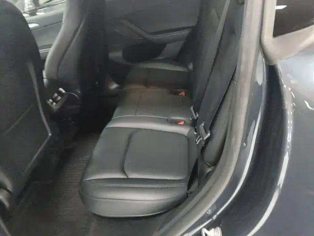 Tesla Model Y — Фото автомобиля 16