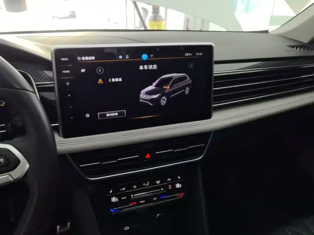 Volkswagen Tiguan L — Фото автомобиля 12