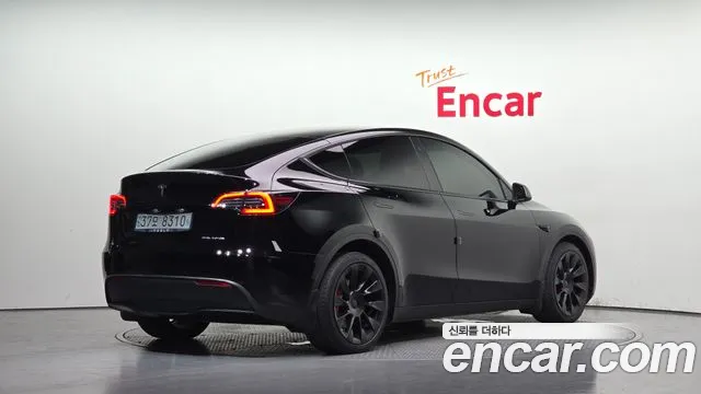 Tesla Model Y — Фото автомобиля 2