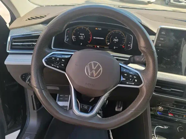 Volkswagen Tiguan L — Фото автомобиля 15