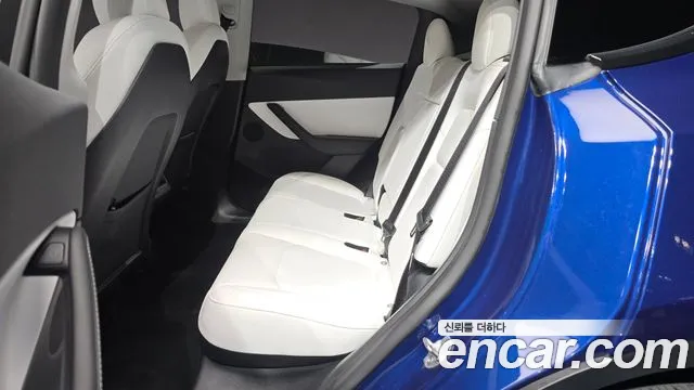 Tesla Model Y — Фото автомобиля 18