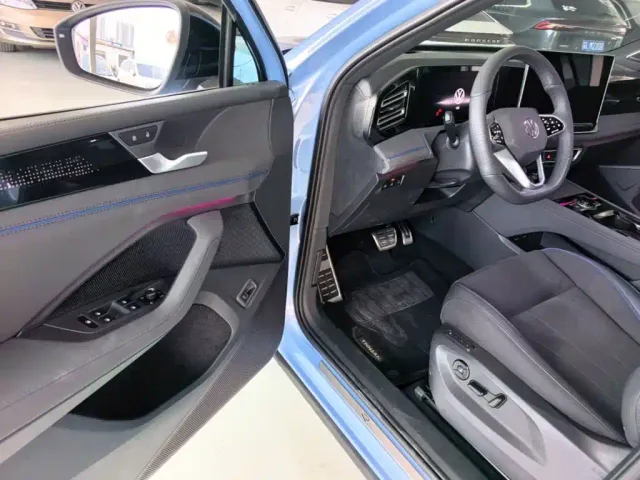 Volkswagen Tiguan L — Фото автомобиля 15