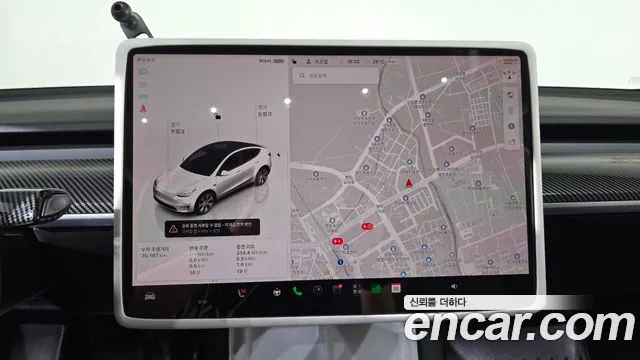 Tesla Model Y — Фото автомобиля 12