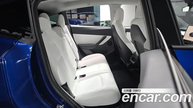 Tesla Model Y — Фото автомобиля 17