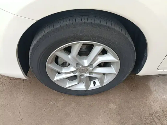 Nissan Tiida — Фото автомобиля 22