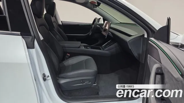 Tesla Model Y — Фото автомобиля 10