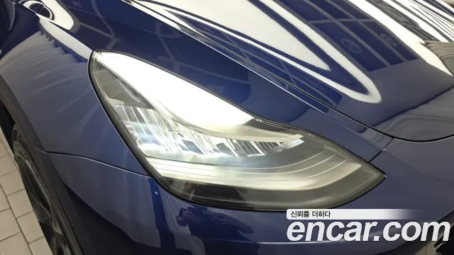 Tesla Model Y — Фото автомобиля 7