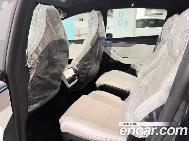 Tesla Model Y — Фото автомобиля 7