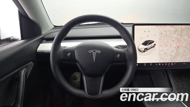 Tesla Model Y — Фото автомобиля 12