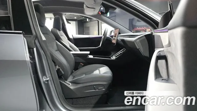 Tesla Model Y — Фото автомобиля 16