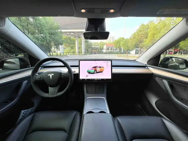 Tesla Model Y — Фото автомобиля 7