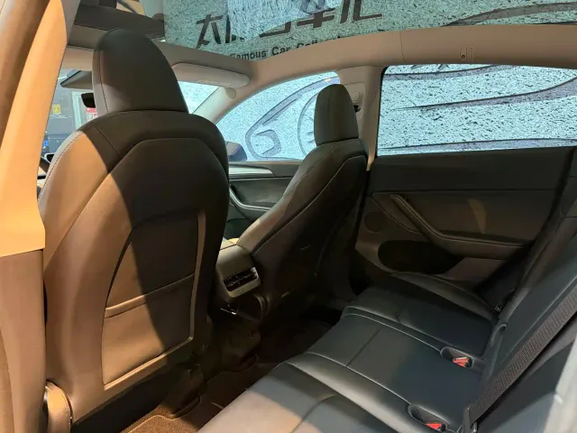 Tesla Model Y — Фото автомобиля 9