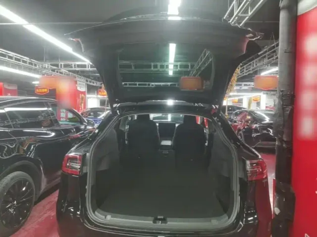 Tesla Model Y — Фото автомобиля 18