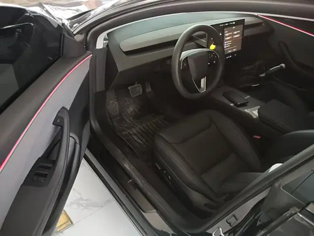 Tesla Model 3 — Фото автомобиля 15