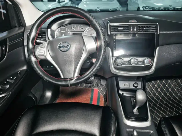 Nissan Tiida — Фото автомобиля 12