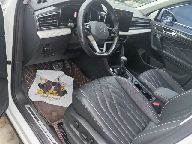 Volkswagen Tiguan L — Фото автомобиля 10