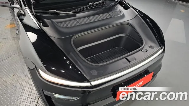Tesla Model Y — Фото автомобиля 9