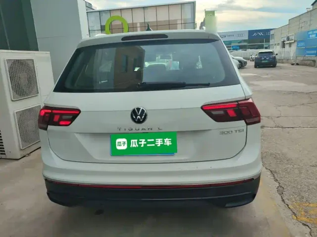 Volkswagen Tiguan L — Фото автомобиля 5