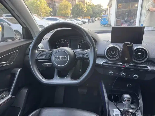 Audi Q2L — Фото автомобиля 11