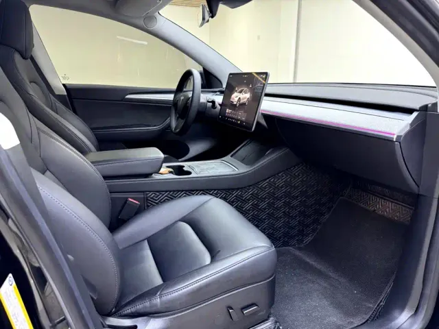 Tesla Model Y — Фото автомобиля 11