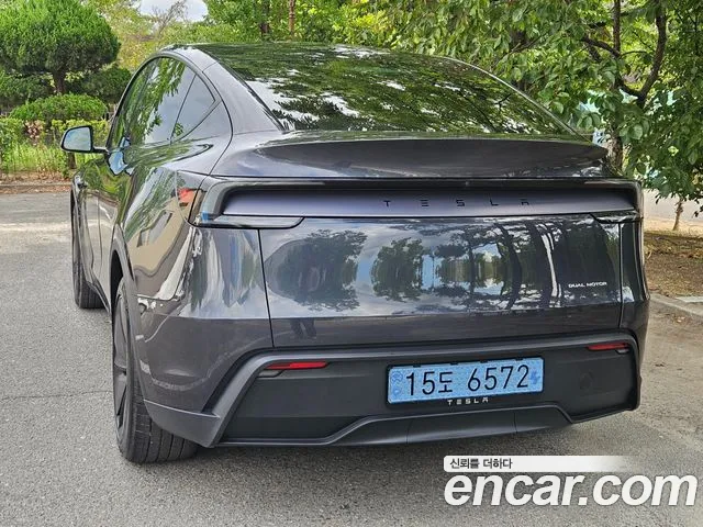 Tesla Model Y — Фото автомобиля 5