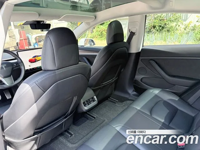 Tesla Model 3 — Фото автомобиля 10
