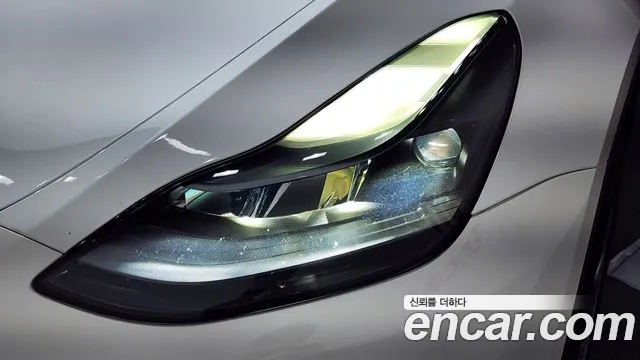 Tesla Model Y — Фото автомобиля 7