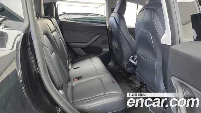 Tesla Model Y — Фото автомобиля 17