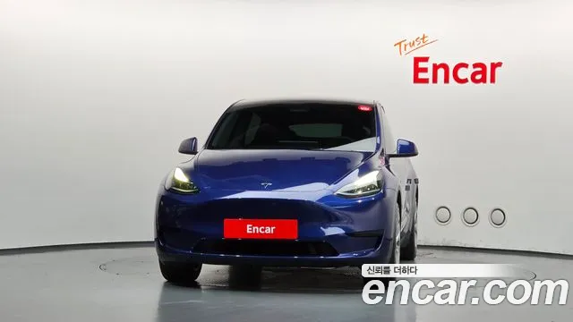Tesla Model Y — Фото автомобиля 3