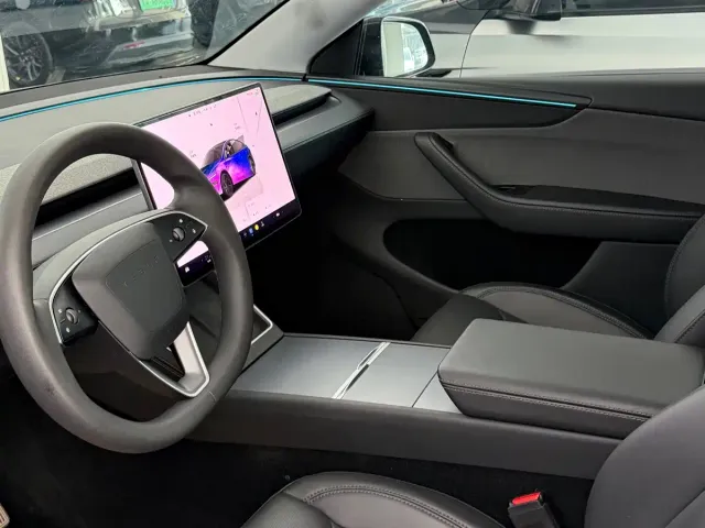 Tesla Model Y — Фото автомобиля 5