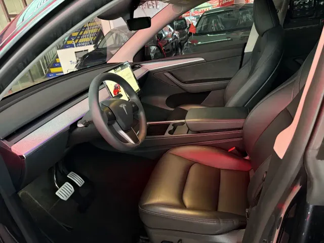 Tesla Model Y — Фото автомобиля 7