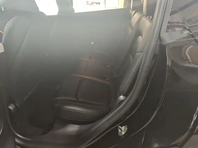 Tesla Model Y — Фото автомобиля 13