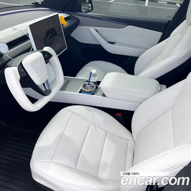 Tesla Model Y — Фото автомобиля 17