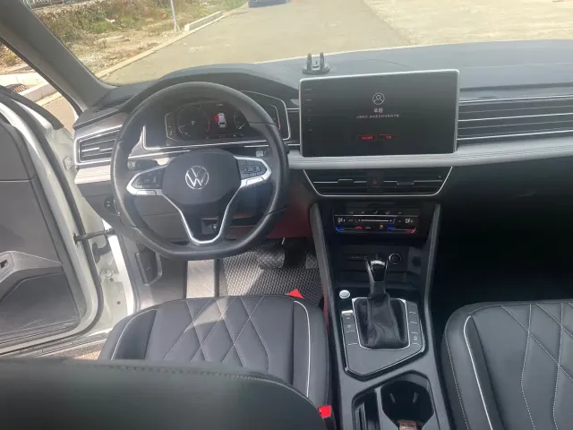 Volkswagen Tiguan L — Фото автомобиля 13