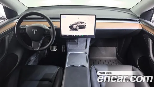 Tesla Model Y — Фото автомобиля 7