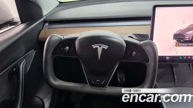 Tesla Model Y — Фото автомобиля 13