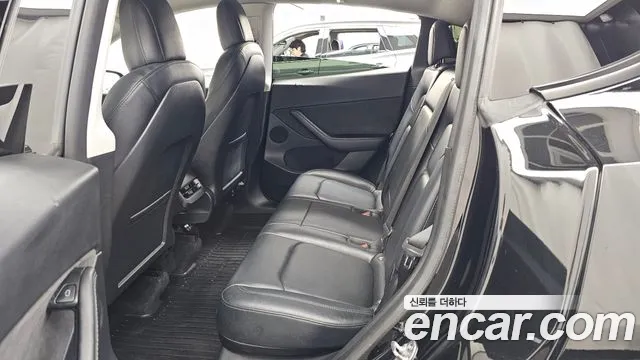 Tesla Model Y — Фото автомобиля 16