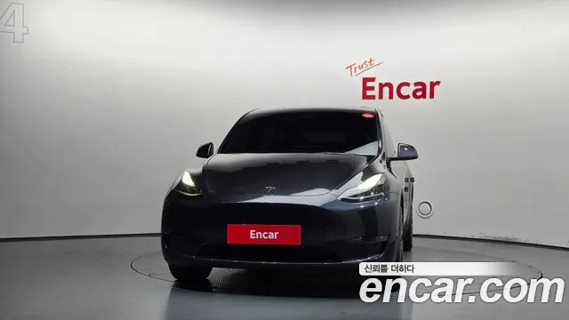 Tesla Model Y — Фото автомобиля 3