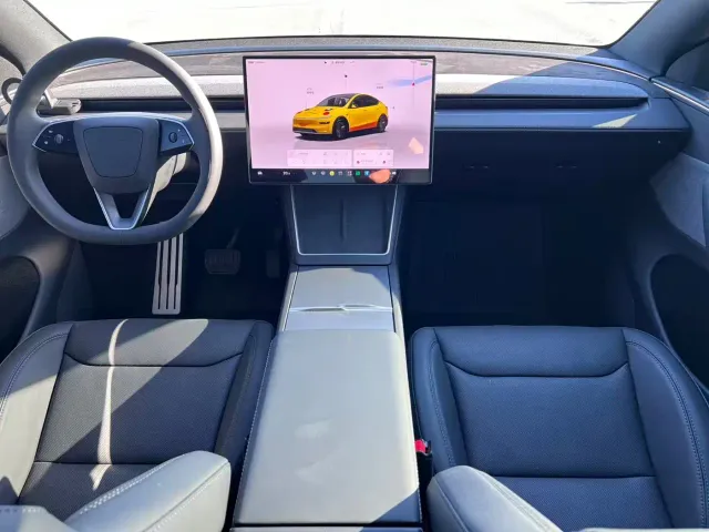 Tesla Model Y — Фото автомобиля 12