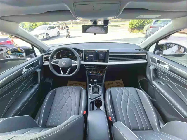 Volkswagen Tiguan L — Фото автомобиля 5