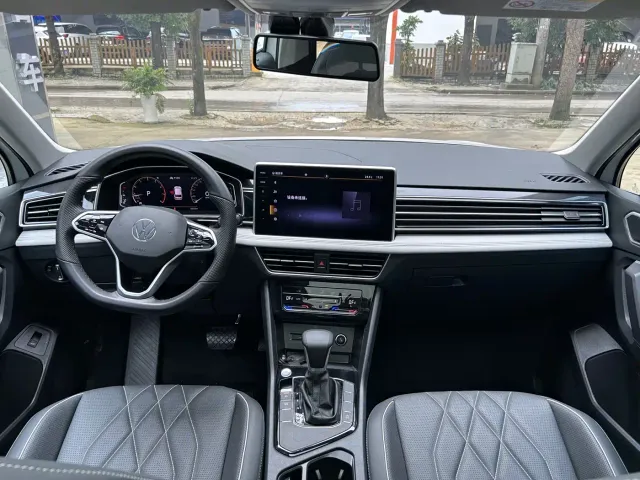 Volkswagen Tiguan L — Фото автомобиля 5