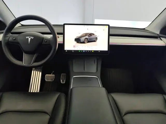 Tesla Model Y — Фото автомобиля 12
